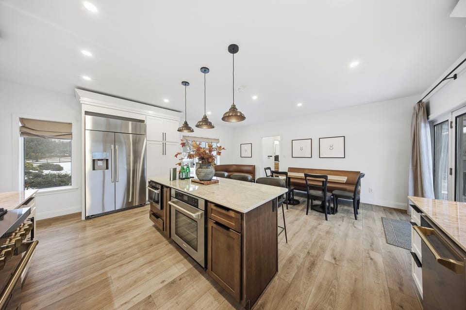 Spacious kitchen with double ovens, perfect for cooking and entertaining.