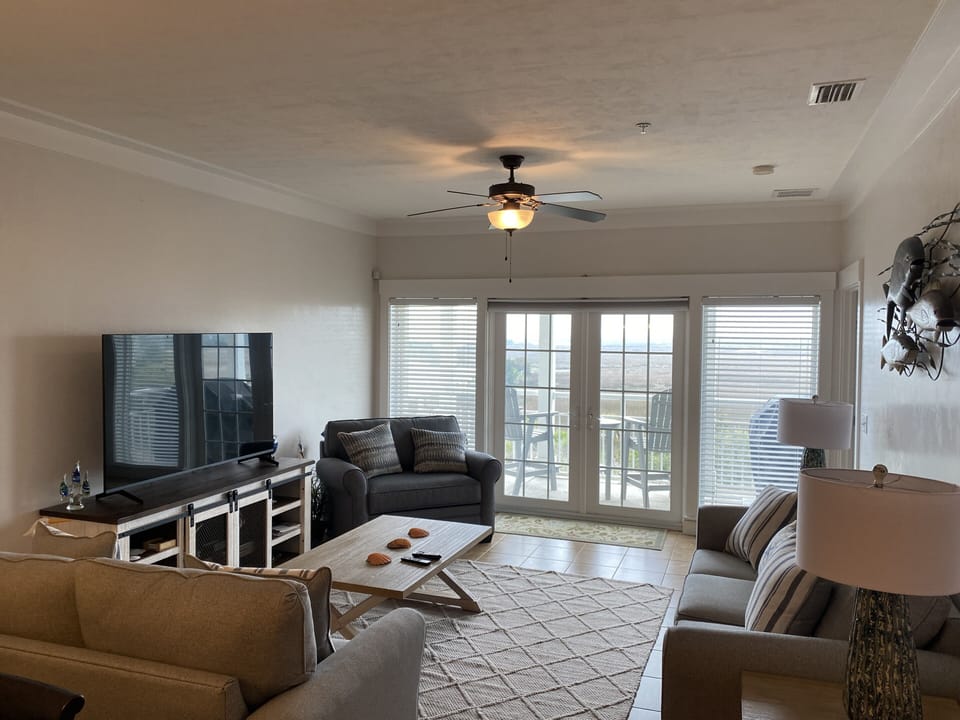 Living room with view of balcony