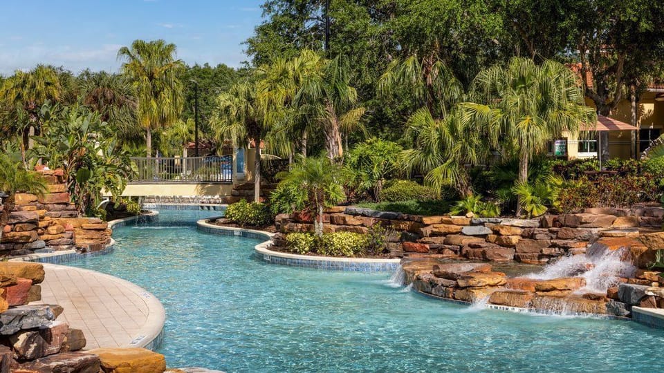Drift along the serene lazy river, surrounded by lush greenery and soothing water.
