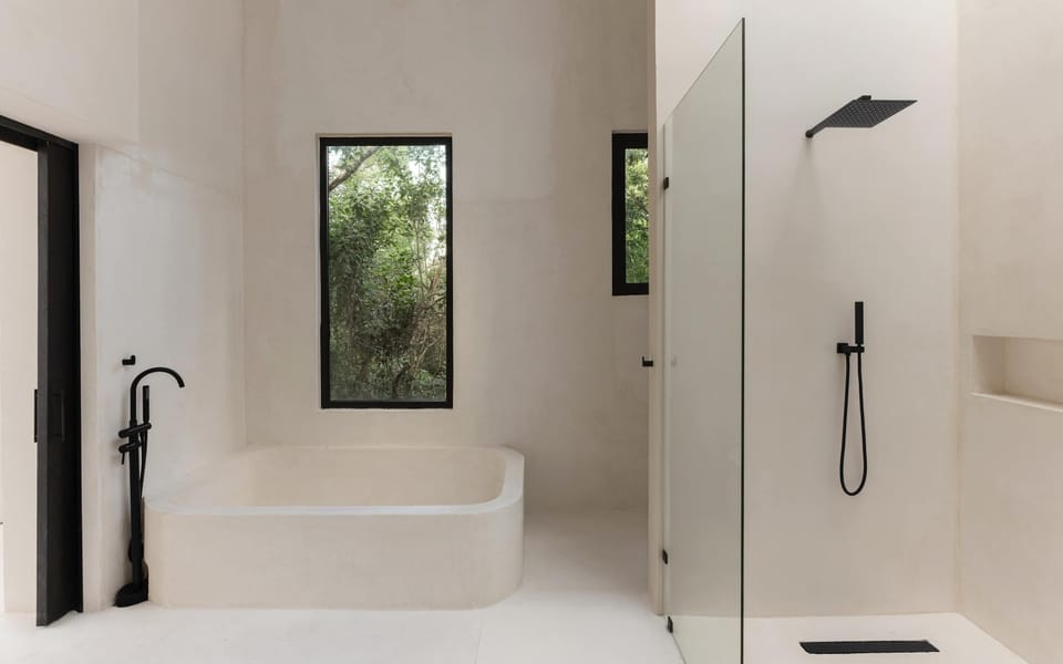 En-suite bathroom with clean lines and refined finishes.