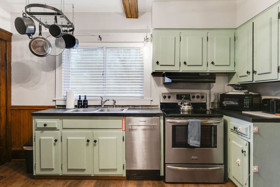 Well equipped kitchen with original details and everything needed for cooking at home near Walnut Beach