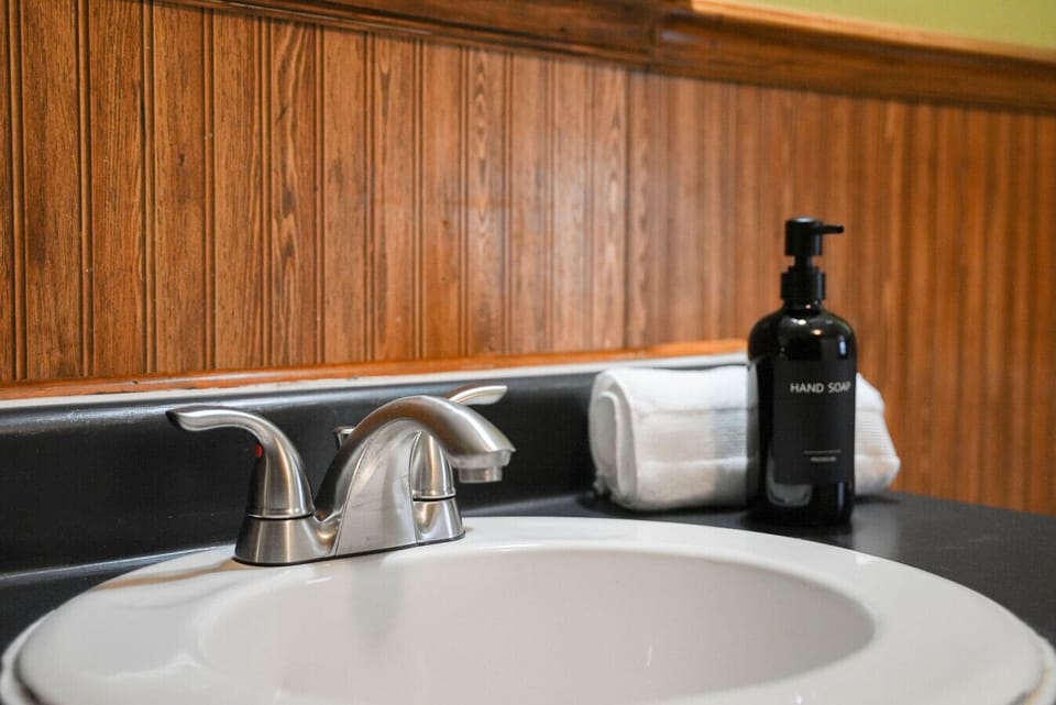 Fresh and clean bathroom stocked with essentials for a comfortable stay.