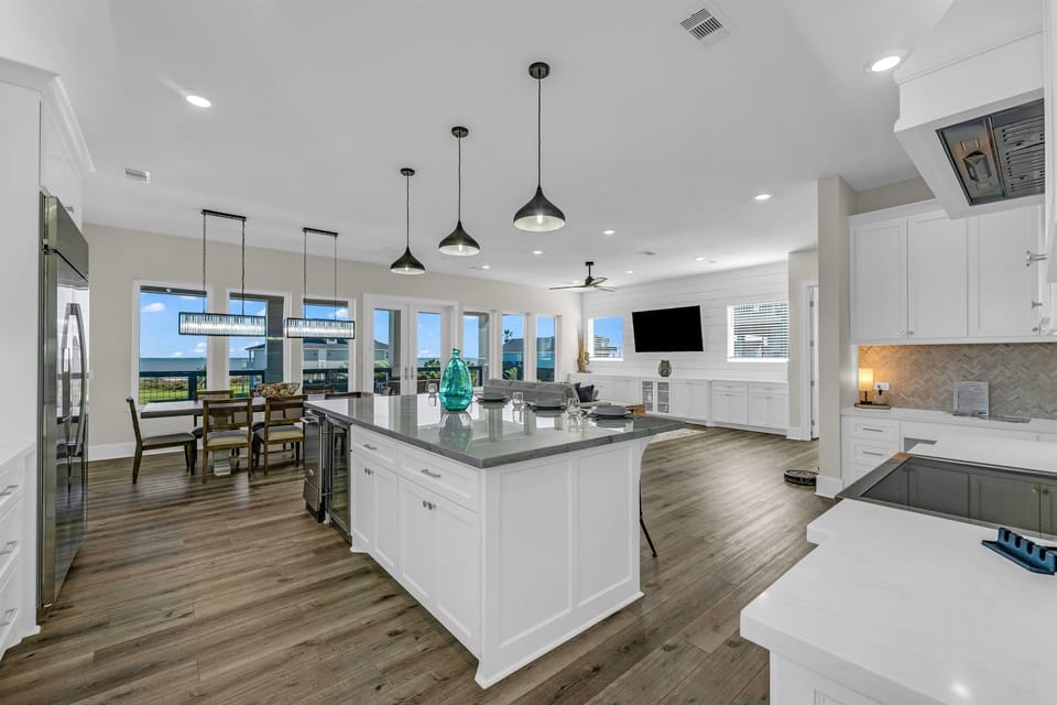 Costa Cristal Kitchen: Step into a sleek kitchen where clean lines and modern finishes create a seamless, contemporary look. Every detail, from the polished countertops to the streamlined cabinetry, exudes sophistication and style.