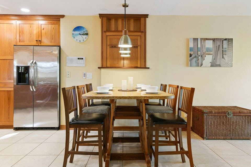 Perfect for breakfast - conveniently located off the kitchen, with bar-height seating and an open layout.