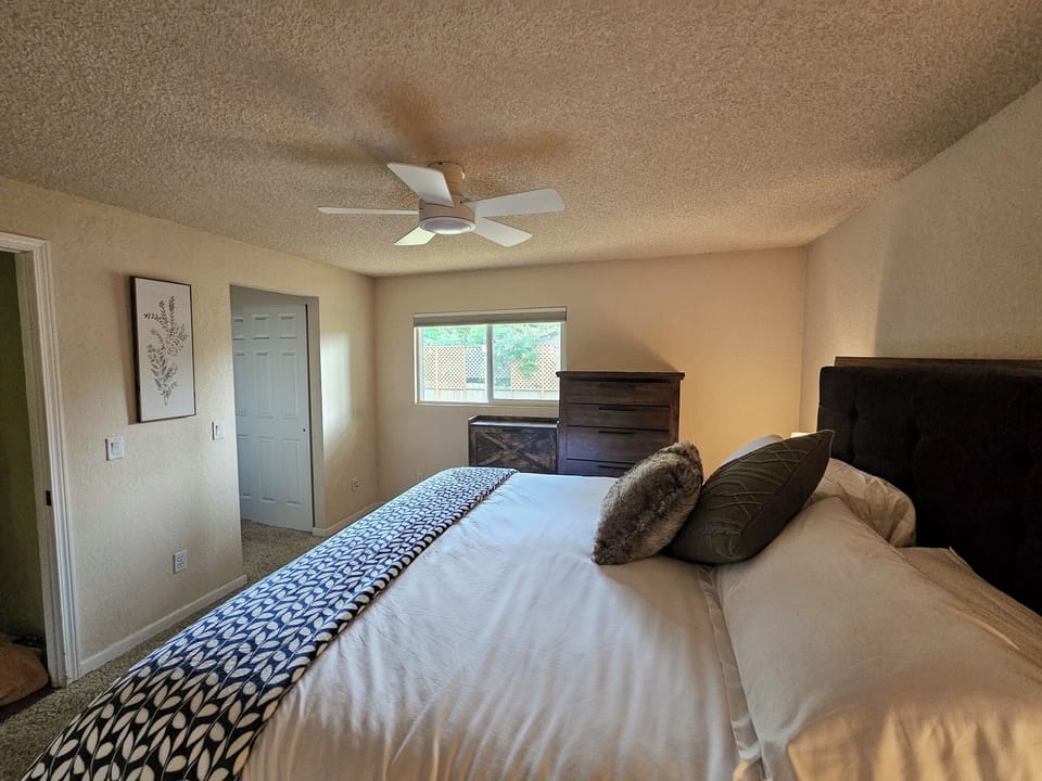 Primary Bedroom - King Bed. Walk through closet + bathroom W/Shower only