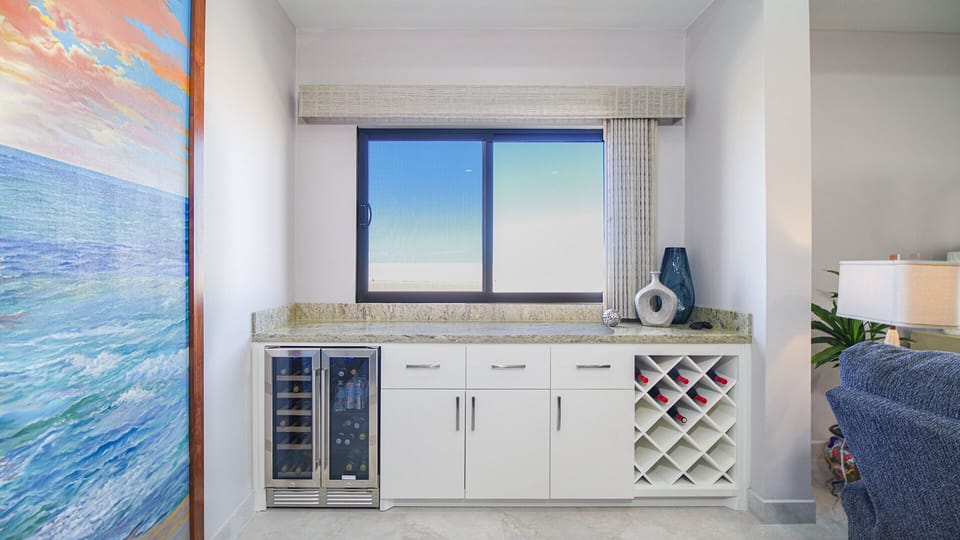 Inset bar area with wine fridge bottle rack