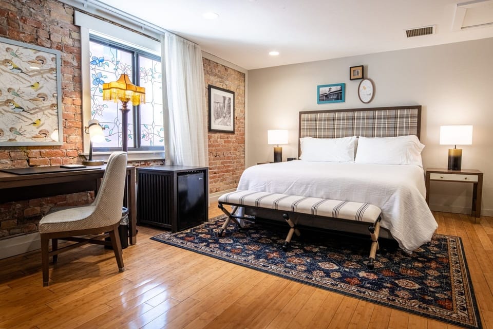 Relax beneath warm lamps and admire the stained-glass window.