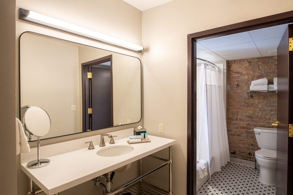Refresh at the bright vanity before a soothing shower.