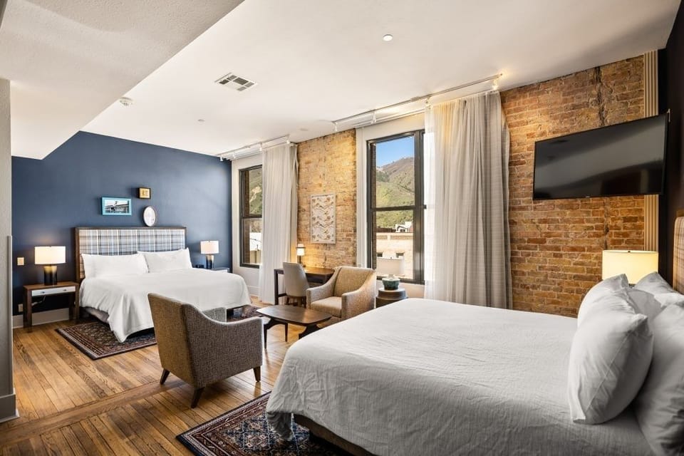 Wake up to mountain views in this airy, brick-lined suite.