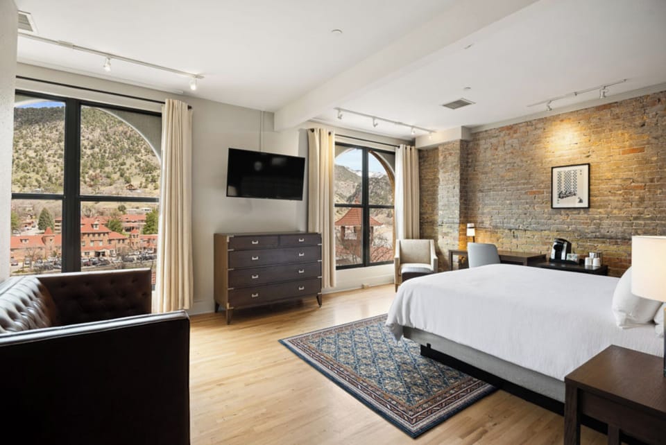 Soak in sunlit mornings with panoramic mountain scenery.