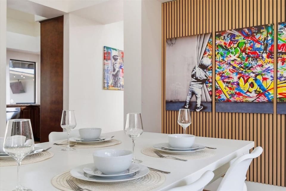Dining area with seating for 6 guests.