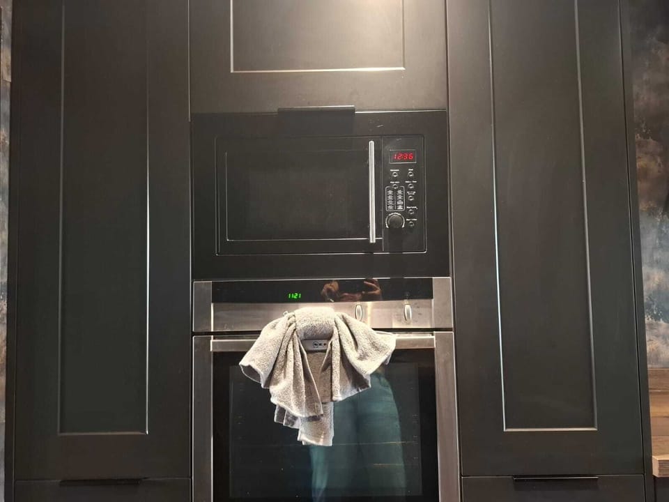 Fully equipped kitchen with built in appliances.