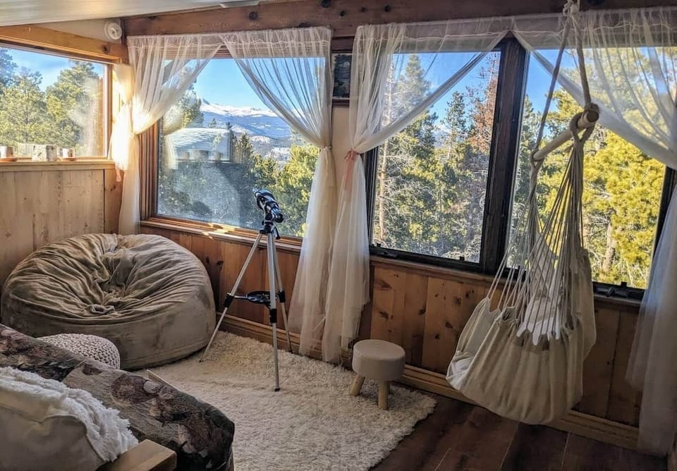 Incredible mountain views from the lofted lounge, accessible via ladder