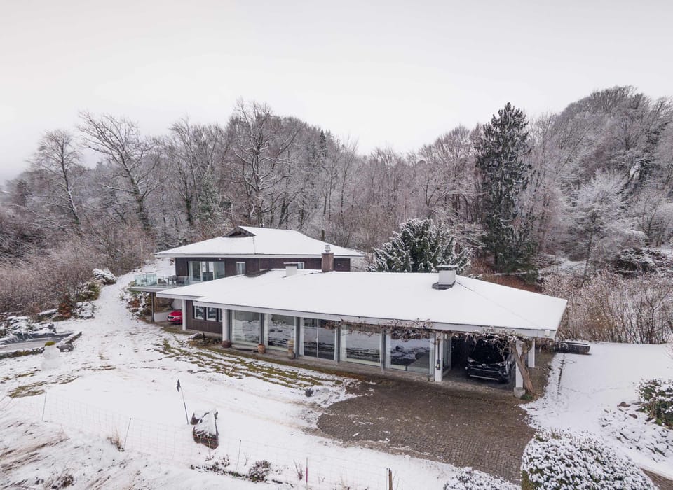 Villa surrounded by snowy nature