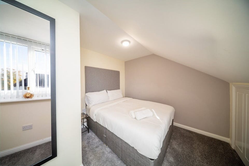 Bedroom 2 — double bedroom with sloped ceiling
