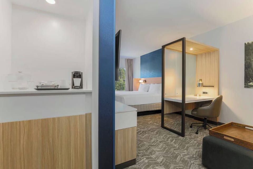 Start mornings with fresh coffee steps from your bed.