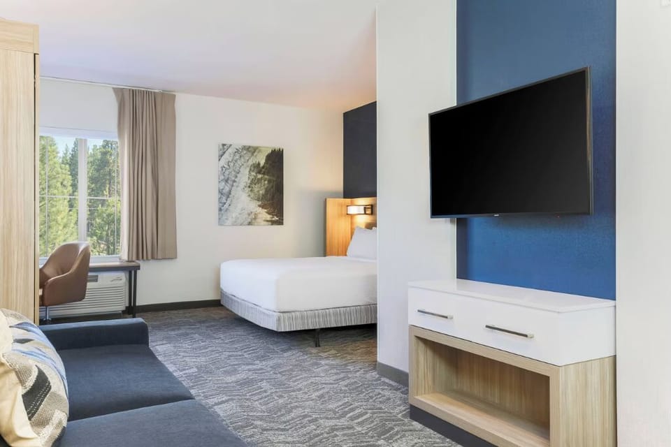 Kick back with your favorite show in a spacious suite.