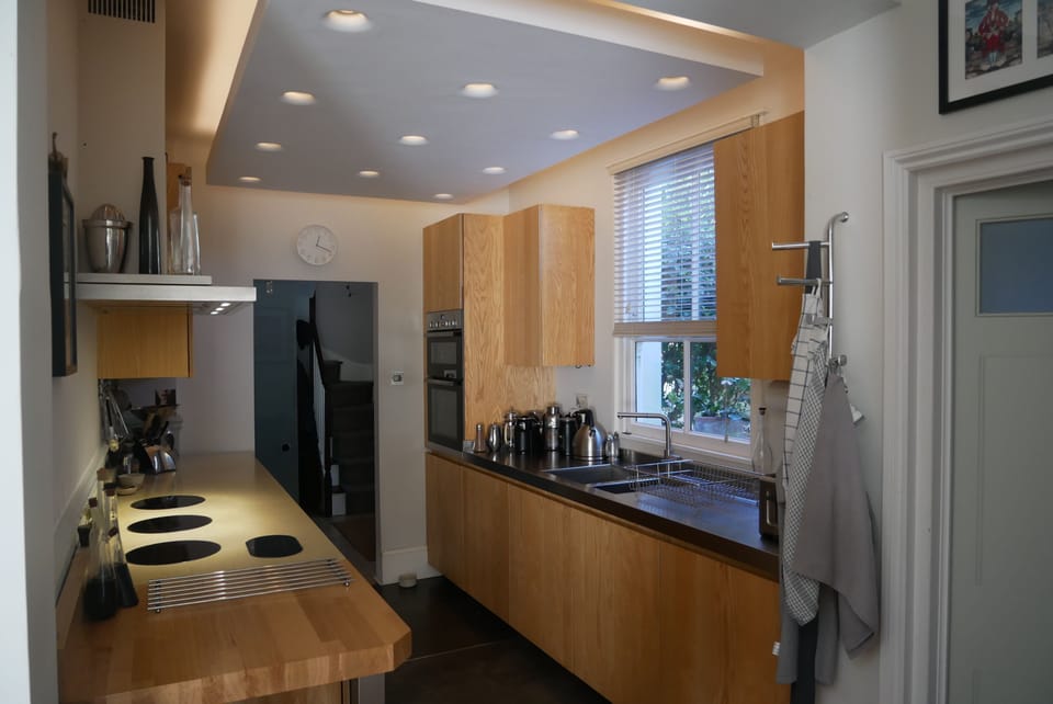 Kitchen with induction hob and double oven