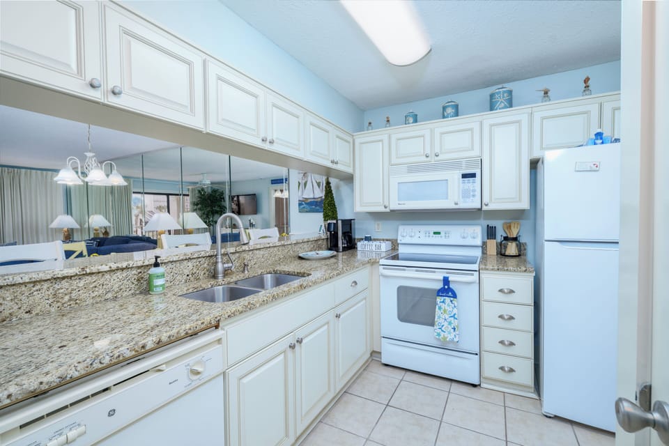 Complete kitchen setup with full-size appliances and essentials for easy meals