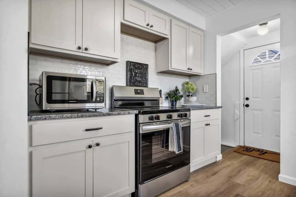 Clean, functional kitchen w/ modern appliances and plenty of cabinet space.