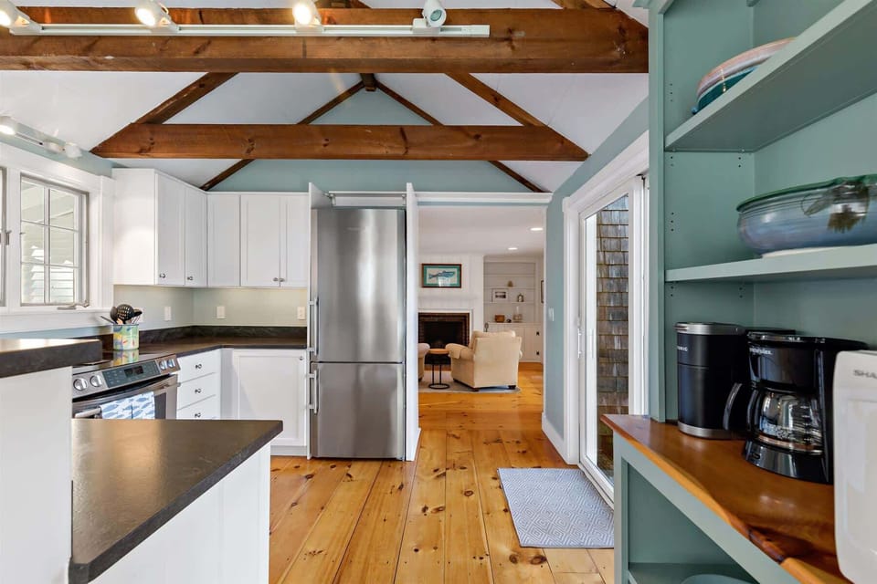 The kitchen makes everyday moments simple, whether you are packing beach snacks, serving breakfast, or winding down with dinner at home.