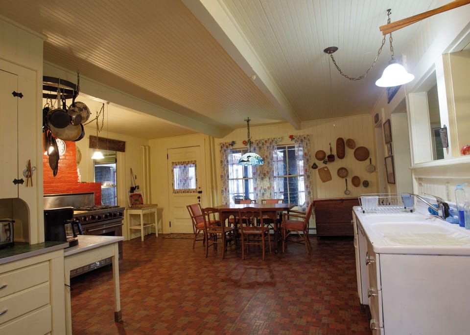 Kitchen viewed from driveway entrance.