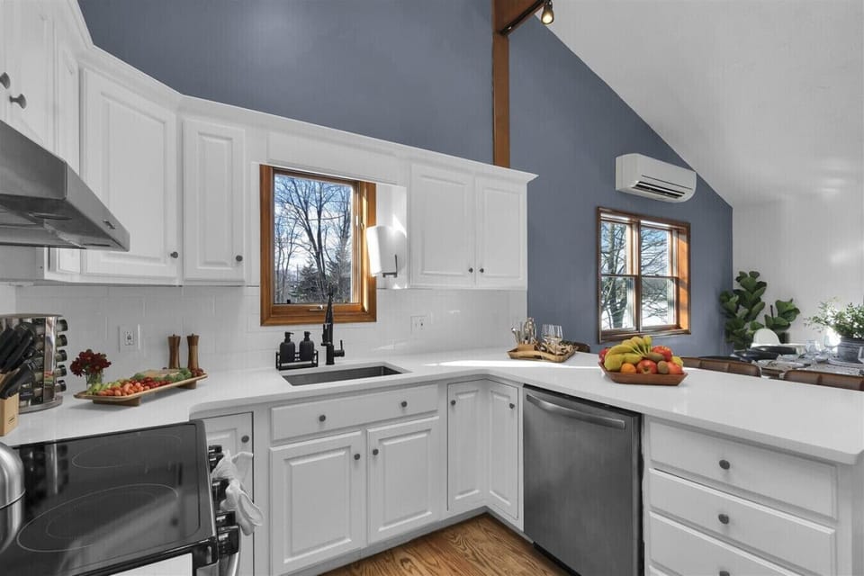 Designed with a convenient peninsula for extra seating and prep space