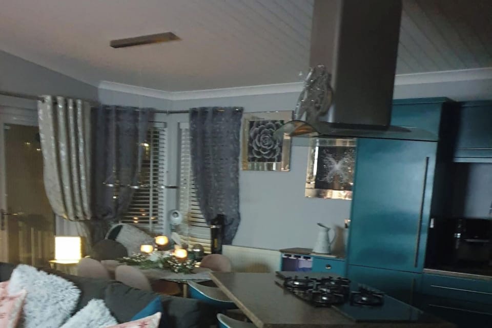 Looking into open kitchen and breakfast table 