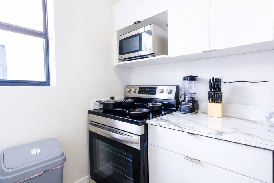Sleek cabinetry perfect for preparing home cooked meals with ease and comfort.