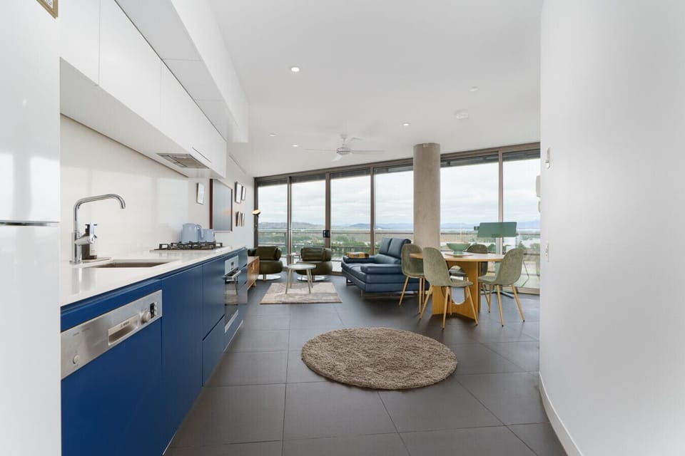 Experience seamless open-plan living where designer style meets panoramic views.