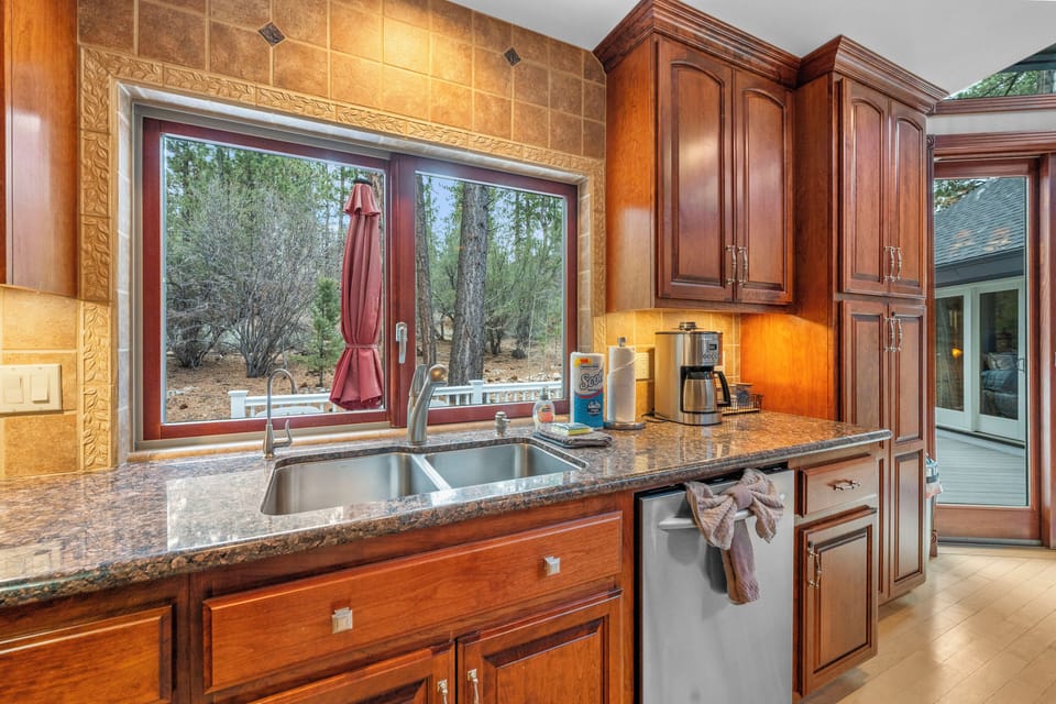 Full Kitchen - Cook with ease in a fully equipped gourmet kitchen featuring high-end appliances and a curated coffee and tea station. Ample counter space and quality cookware make preparing delicious home-cooked meals effortlessly enjoyable.