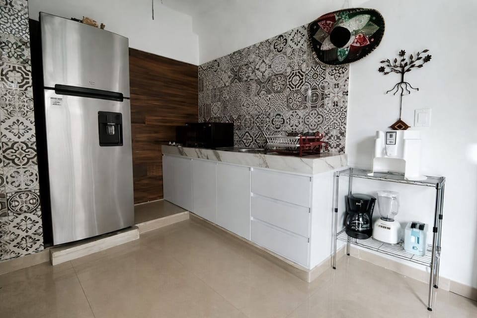 Cocina con todo lo necesario para la preparación de deliciosos platillos.
