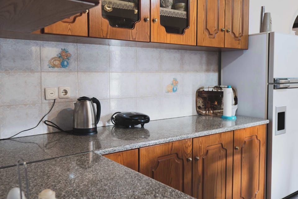 Kitchen details including appliances and preparation space for a convenient stay.