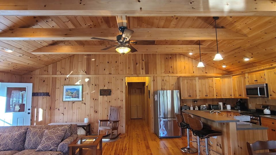 Cabin great room from screen porch area