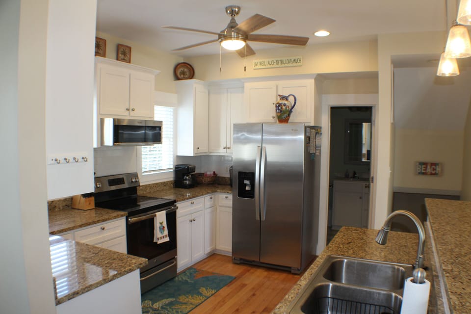  A full kitchen provides adequate space to prepare meals if you want to eat in.