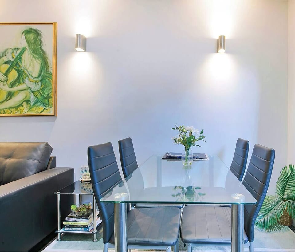 Enjoy light meals together around the four-seat dining table before heading out for the day.