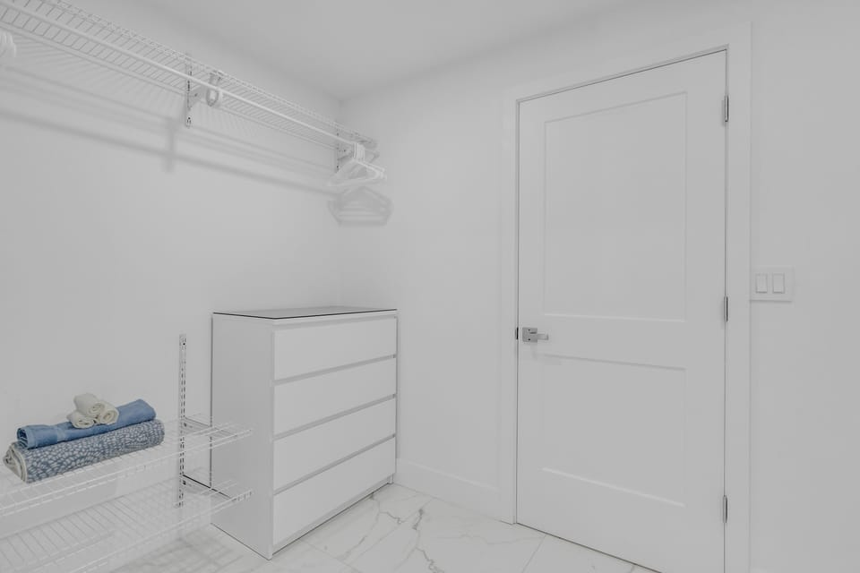 Master Closet - split with 2 sides, full-length mirror, drawers & hanging space.