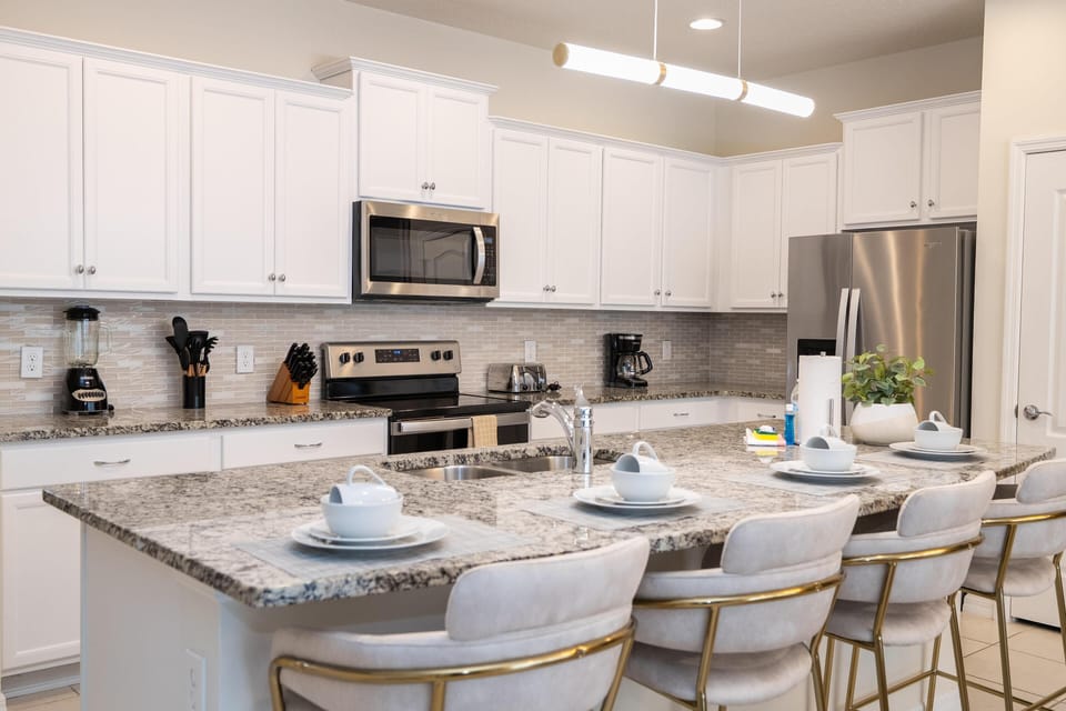 Modern kitchen with spacious island and stylish seating