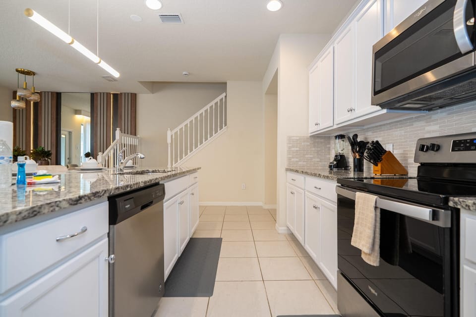 Bright, modern kitchen with sleek appliances and ample counter space