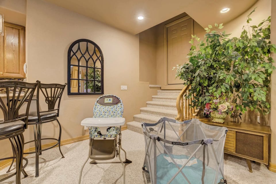 We prioritize family comfort by providing a pack-n-play and high chair for our youngest guests. These amenities are located near the kitchen and dining area, making it easy for families to enjoy their mountain getaway together.