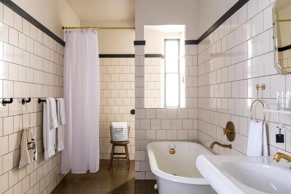 Soak and recharge in a bright, vintage-inspired clawfoot tub.