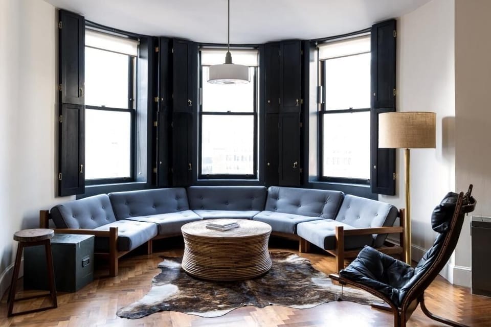 Sink into the sectional and soak up panoramic window light.