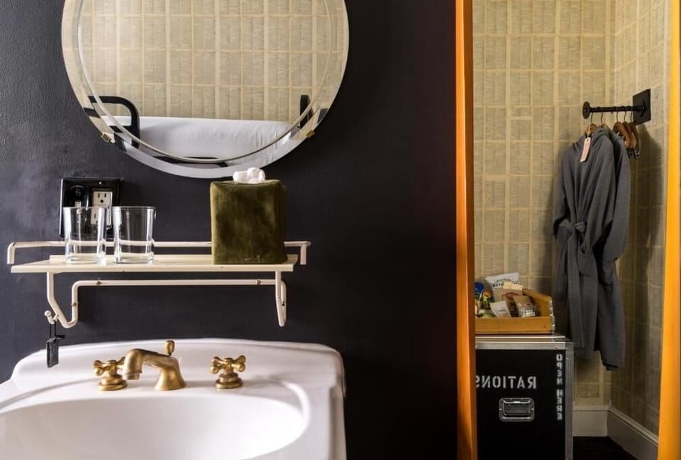 Start mornings with plush robes and an easy in-room washstand.
