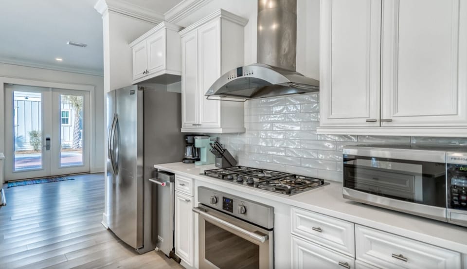 Chef's Kitchen featuring top end appliances