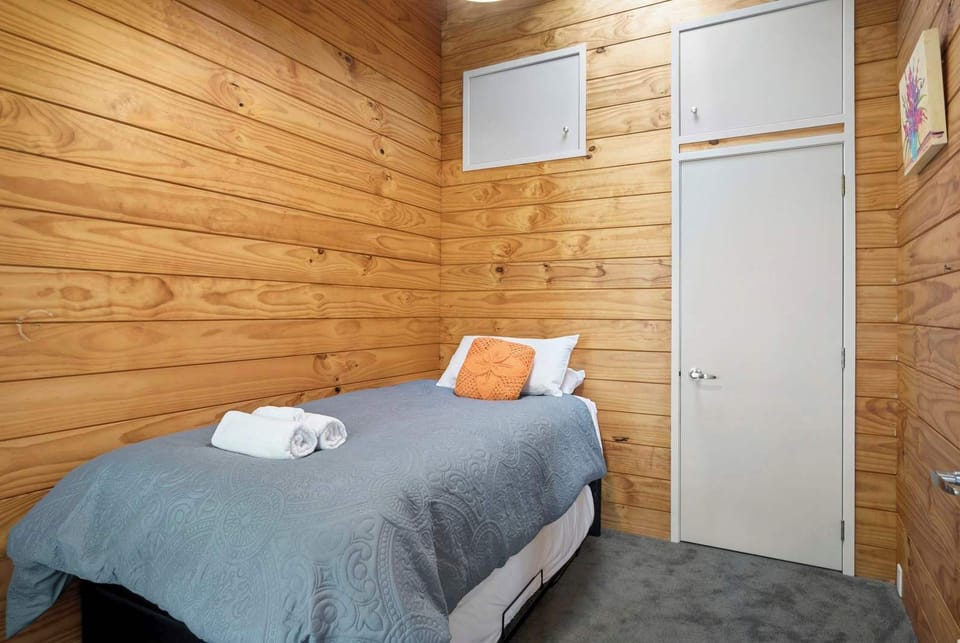 Bedroom two has a King Single Bed with a pull out single bed underneath. Perfect for the kids!