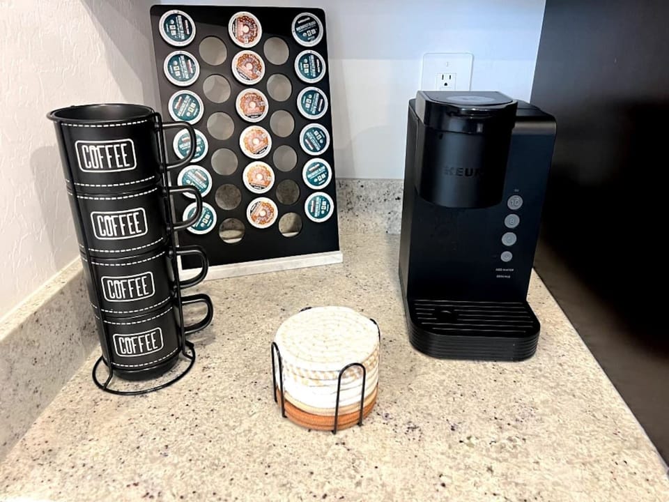 Coffee station with pod holder
