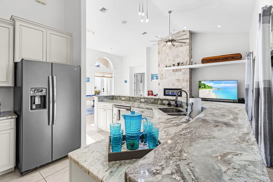 Enjoy the fully-equipped kitchen with stainless steel appliances