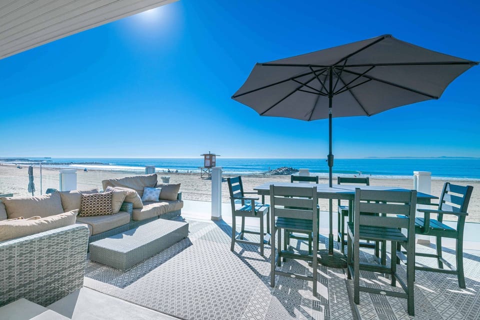 Linger on the balcony while sipping coffee from the lounge seating or gathering for dinner at the table for six
                