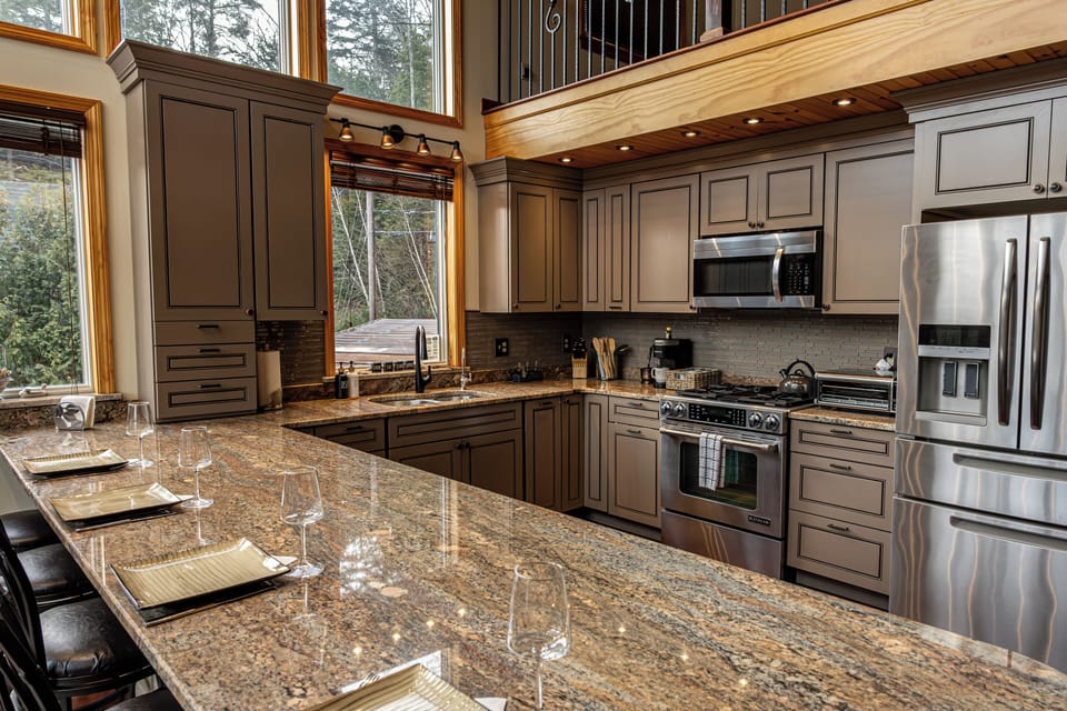 Fully equipped lakefront kitchen island ready for meals & wine