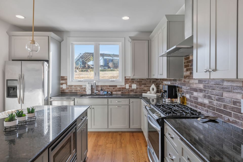Upscale chef's kitchen, fully stocked for a large party.